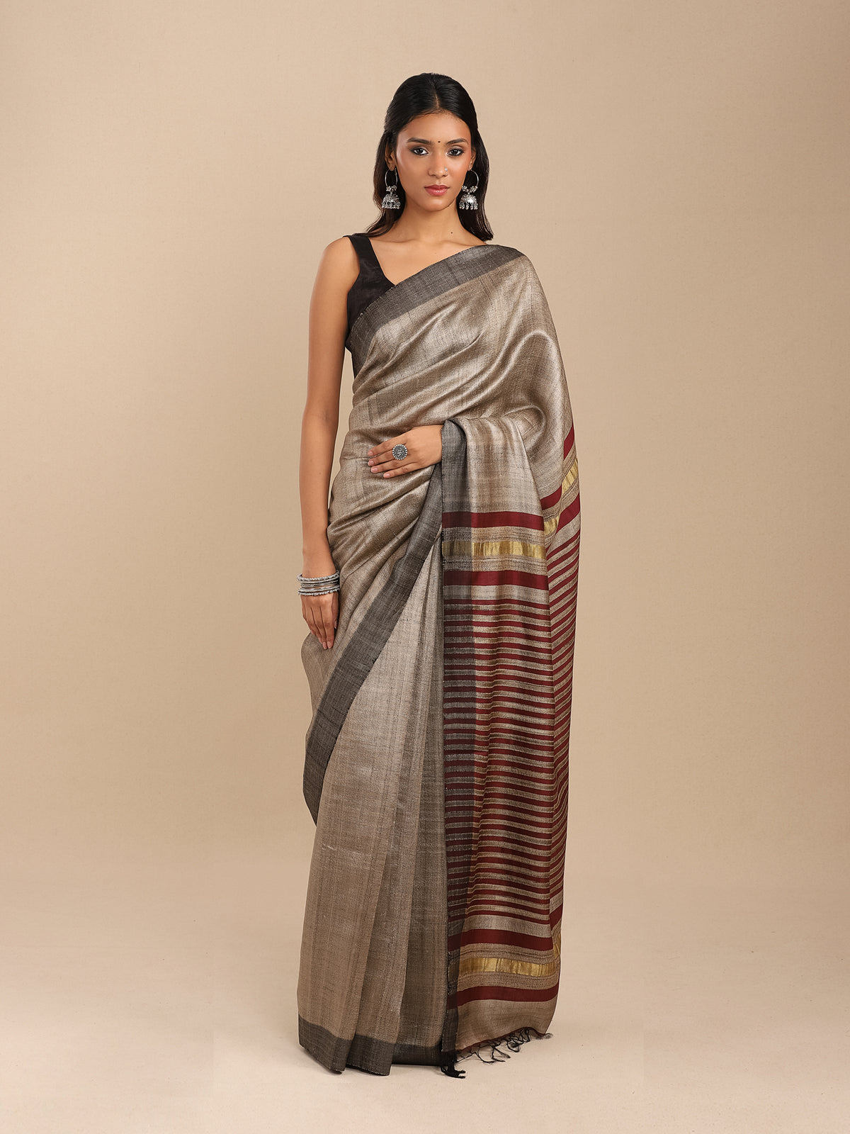 Tussar silk with gold zari and maroon stripes