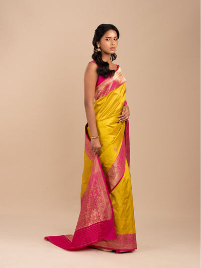 Mango-yellow banarasi saree with hot-pink border in pure Katan silk