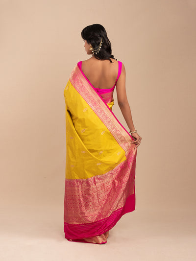 Mango-yellow banarasi saree with hot-pink border in pure Katan silk