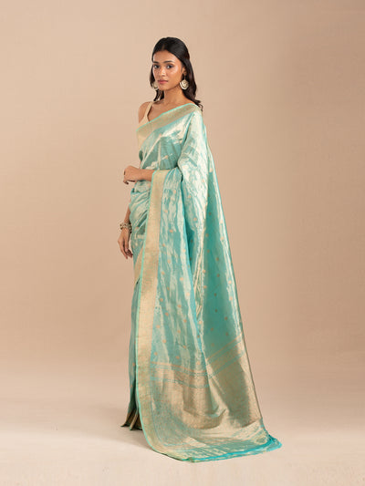 Sea green and gold tissue saree