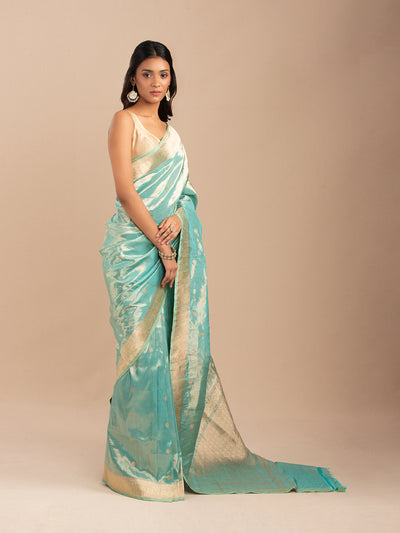 Sea green and gold tissue saree
