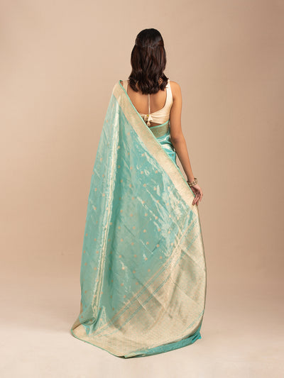Sea green and gold tissue saree