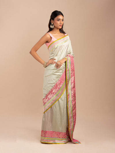 Muted mint-green Banarasi saree in Katan silk